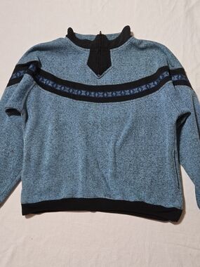 Vintage Blue Zip-Up Sweater with Black Trim and Geometric Band